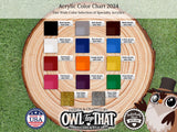 an owl with a top hat is next to a color chart